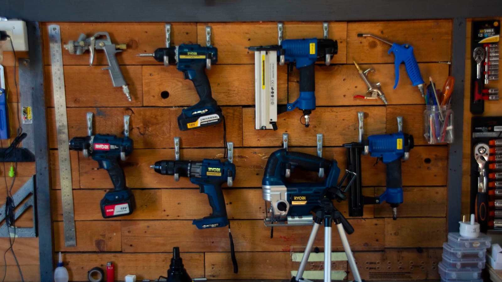 Hand tools hanging on a workshop wall