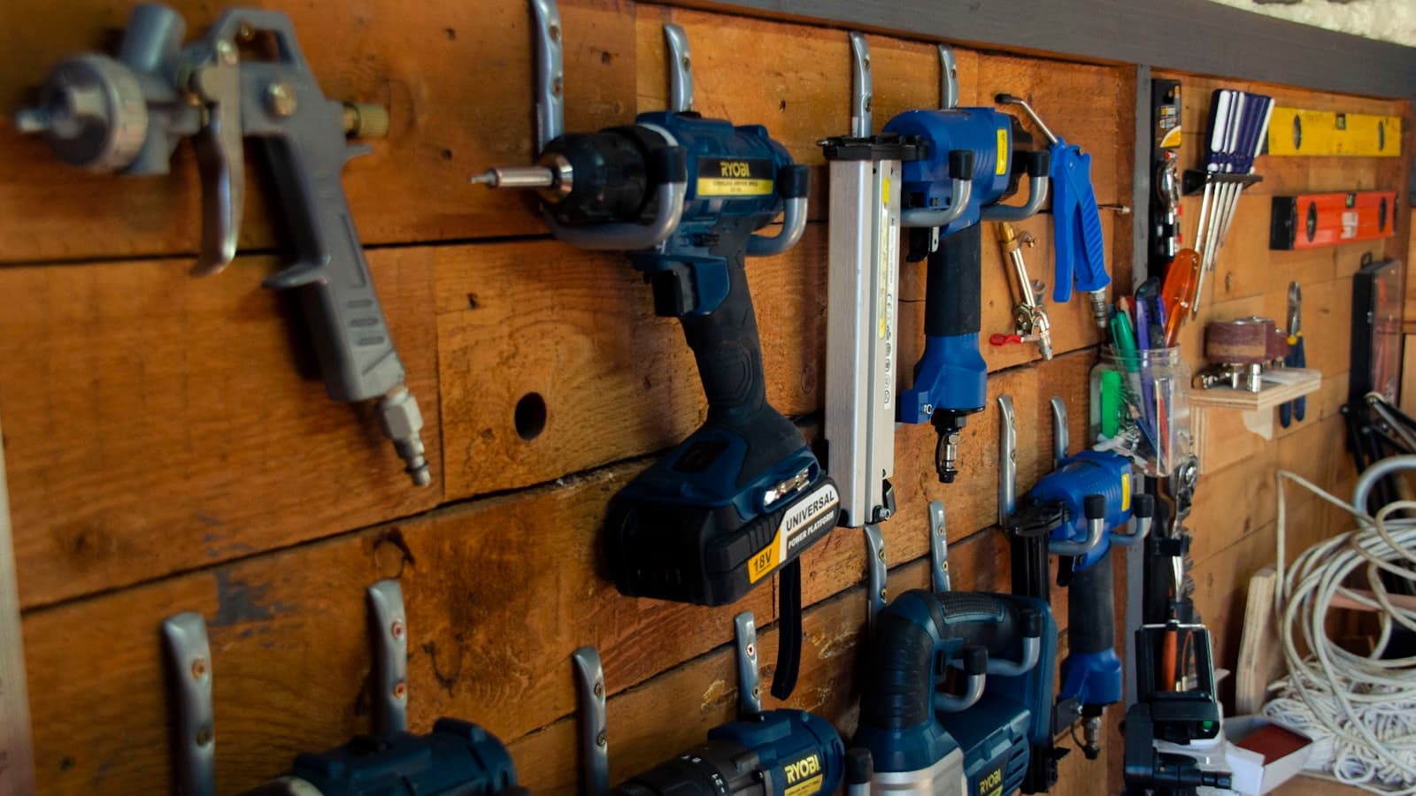 Trade tools hanging on a workshop wall