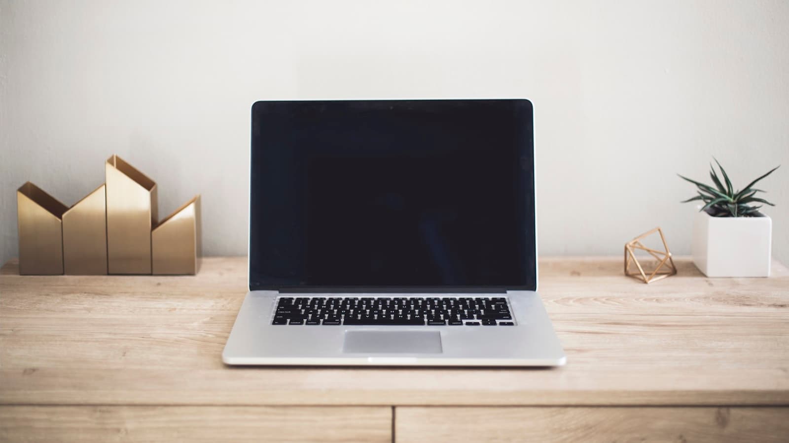 Laptop on a tidy home office desk